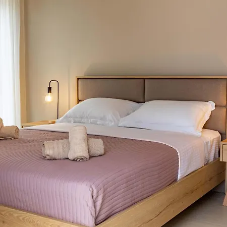 Апартаменты Olivevine Luxury Apartments-