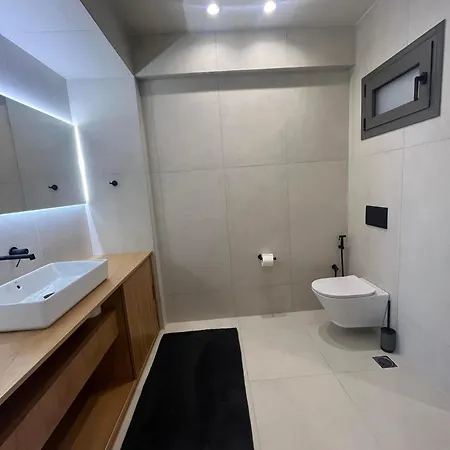 Апартаменты Olivevine Luxury Apartments-