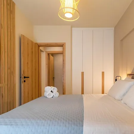 Апартаменты Olivevine Luxury Apartments-